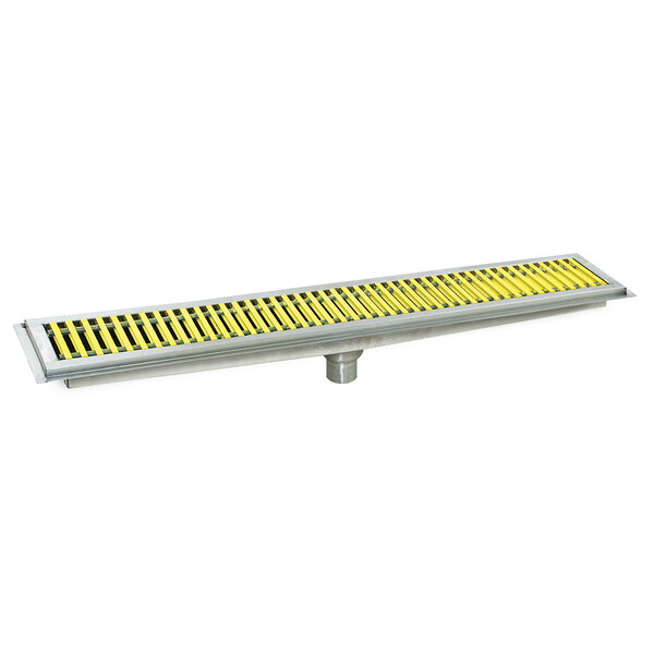 A metal floor trough grate with yellow and black stripes.