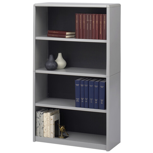 A gray Safco bookcase with books and vases.