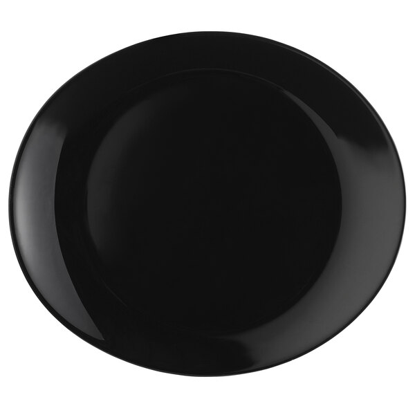 A black oval Arcoroc glass plate.