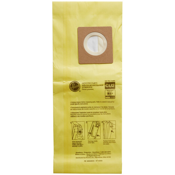A close-up of a yellow Hoover allergen filtration vacuum bag with a circular opening.