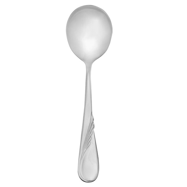 A silver Walco Goddess bouillon spoon with a curved handle.