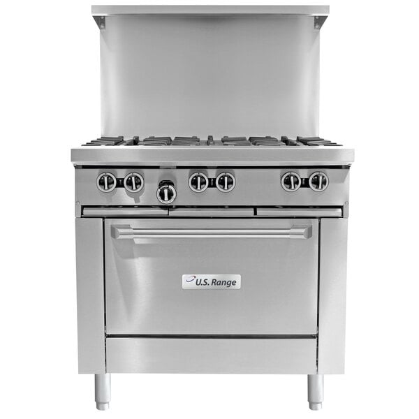 A U.S. Range stainless steel commercial gas range with 4 burners, a manual griddle, and an oven.