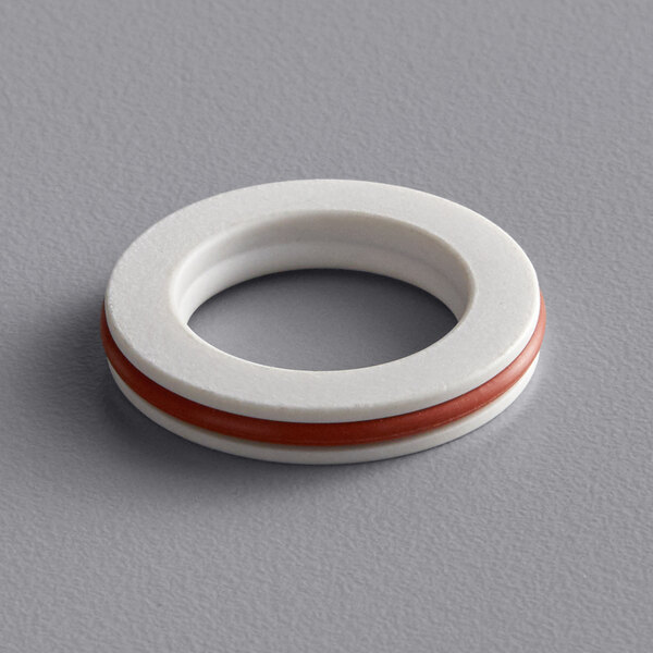 A white and red gasket with a red circle and strip.