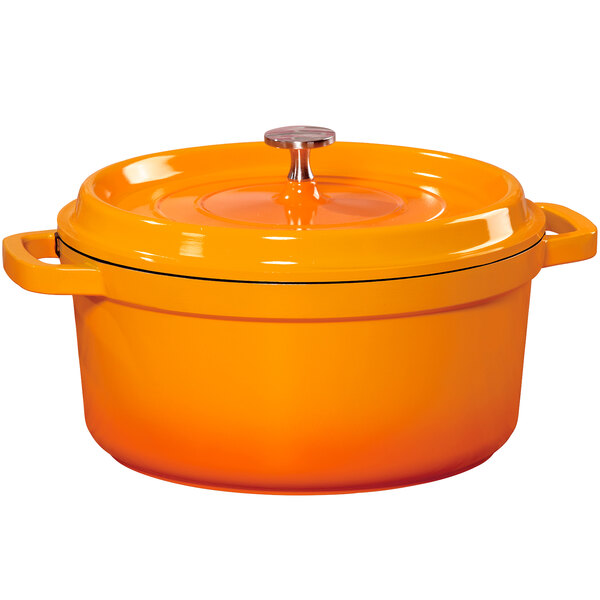 An orange enamel coated round Dutch oven with a lid.