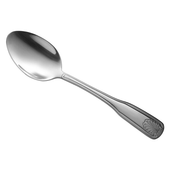 A Libbey stainless steel dessert spoon with a coral design on the handle.