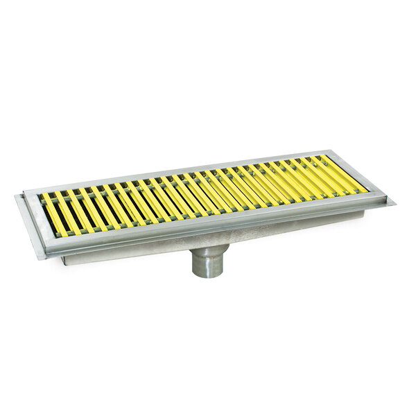 A metal floor trough drain with yellow and white stripes and a yellow fiberglass grate.