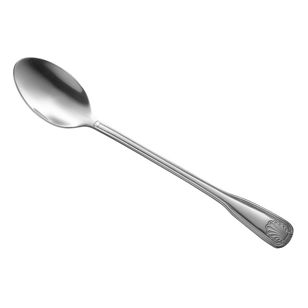 A close-up of a Libbey stainless steel iced tea spoon with a coral handle.