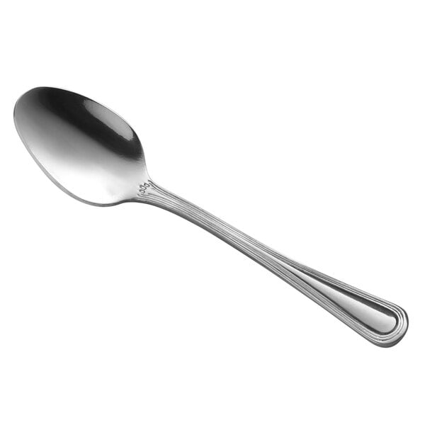 A Libbey stainless steel demitasse spoon with a silver handle and spoon.