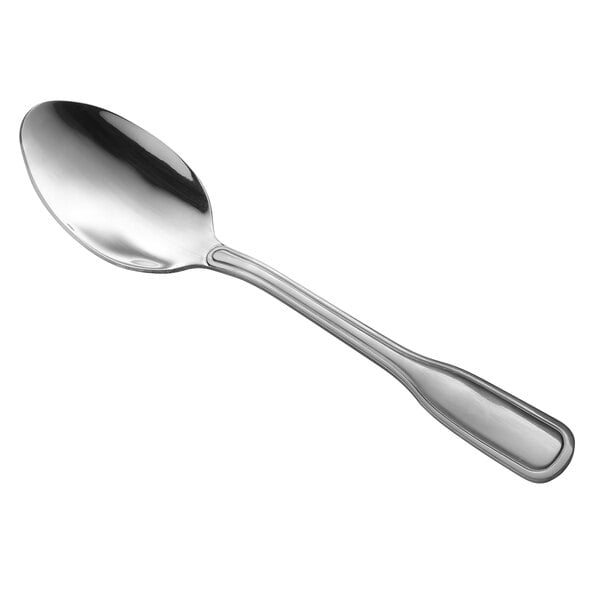 A Libbey Wellington stainless steel tablespoon with a silver handle.
