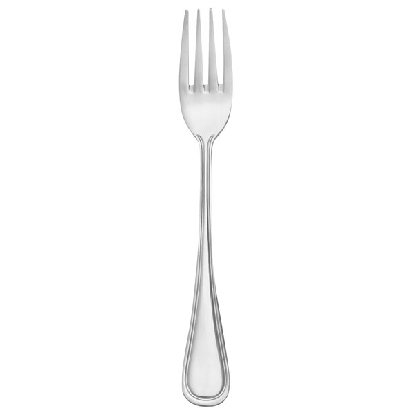 A silver Libbey McIntosh dinner fork with a white background.