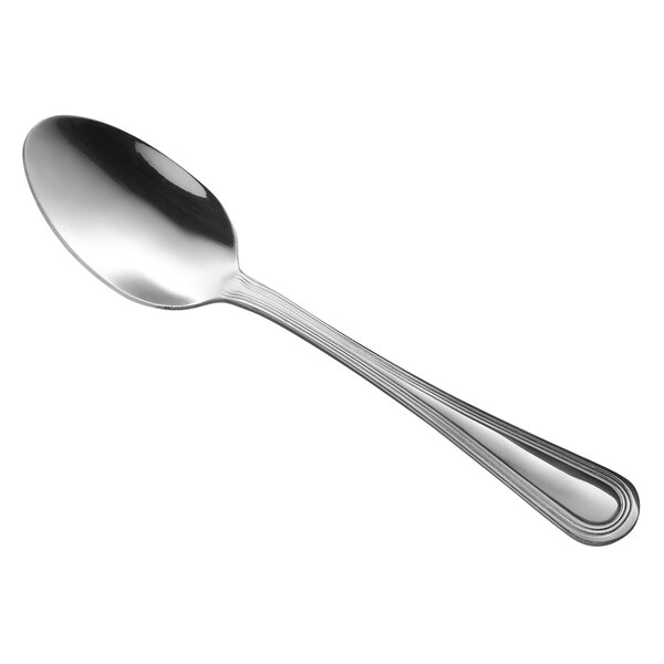 A Libbey stainless steel dessert spoon with a silver handle and spoon.