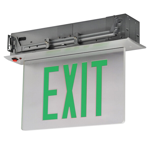 A white recessed exit sign with green lettering.