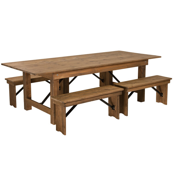 A Flash Furniture rustic wooden farm table with two benches.
