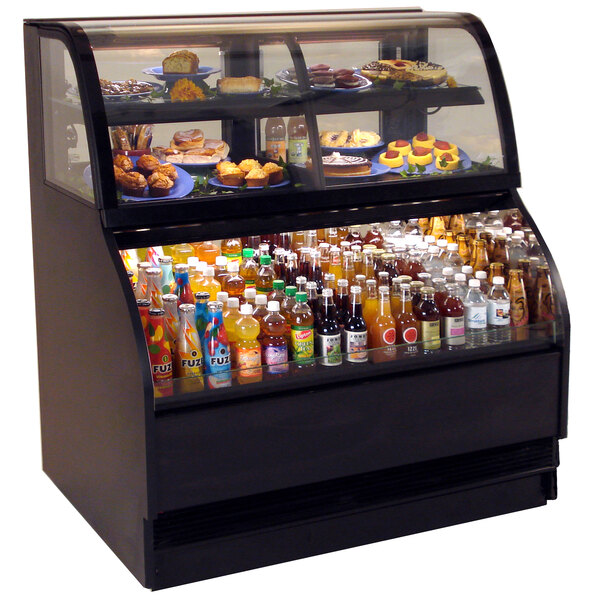 A black Structural Concepts refrigerated dual service merchandiser with drinks and food displayed inside.