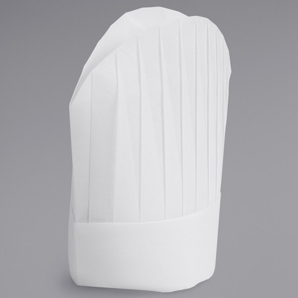 A close-up of a white Mercer Culinary chef's hat with pleats.
