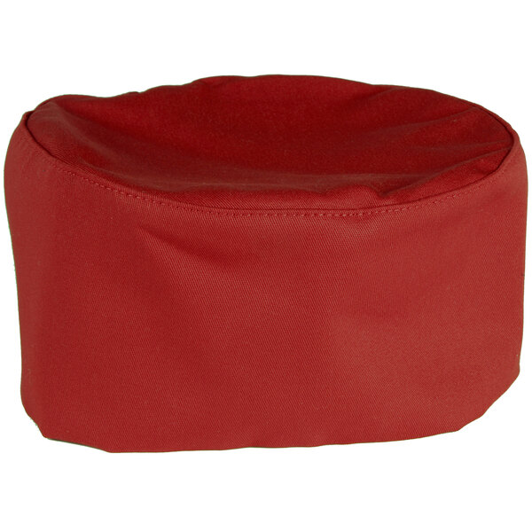 A red Mercer Culinary Millennia baker's skull cap on a white background.