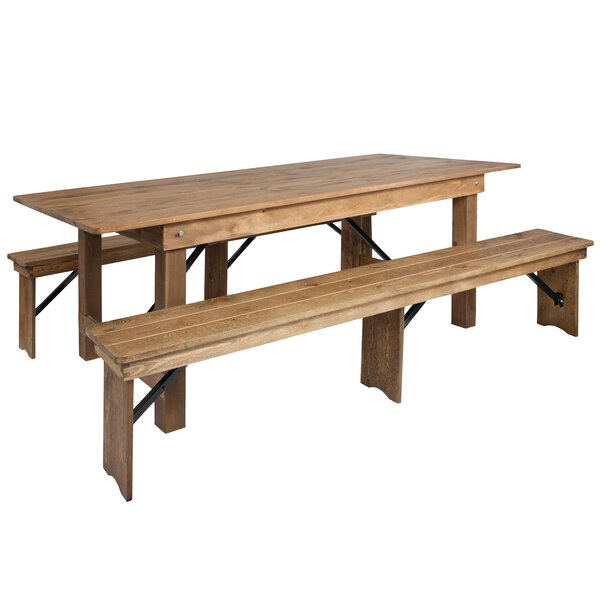 A Flash Furniture wooden farm table with two benches.