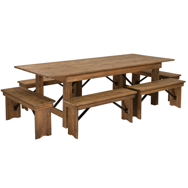 A Flash Furniture rustic wooden farm table with benches.