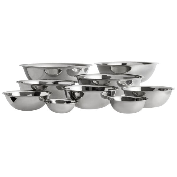 A set of Vollrath stainless steel mixing bowls.
