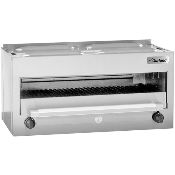 A close-up of the grill on a stainless steel Garland countertop salamander broiler.
