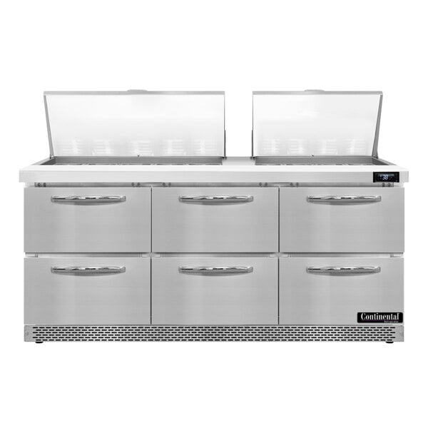 A stainless steel Continental Refrigerator with six drawers.