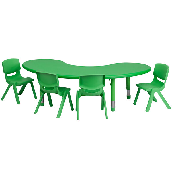 A green plastic half-moon table with two green chairs.