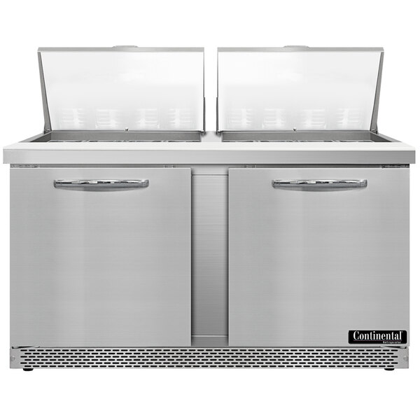 A large stainless steel Continental Refrigerator with two doors on a counter.