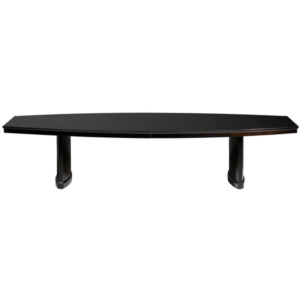 A long black Safco Sorrento conference table with legs.