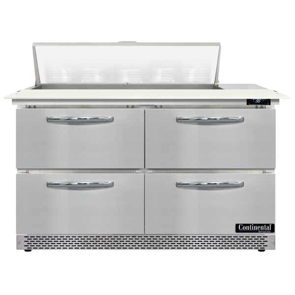 A large stainless steel Continental Refrigerator with 4 drawers for countertop sandwich prep.