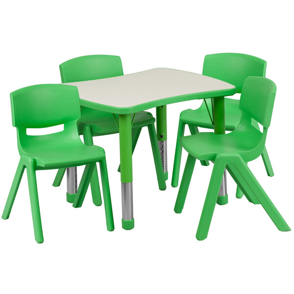 A green plastic rectangular table and chairs.