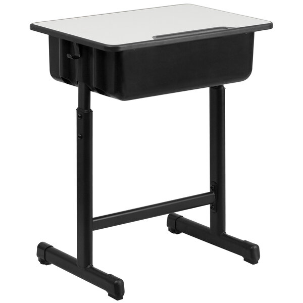 A black school desk with a white top.