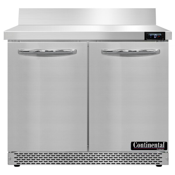 A stainless steel Continental worktop freezer with two doors.