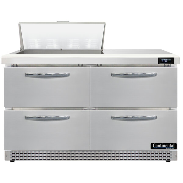 A stainless steel Continental Refrigerator with 4 drawers.