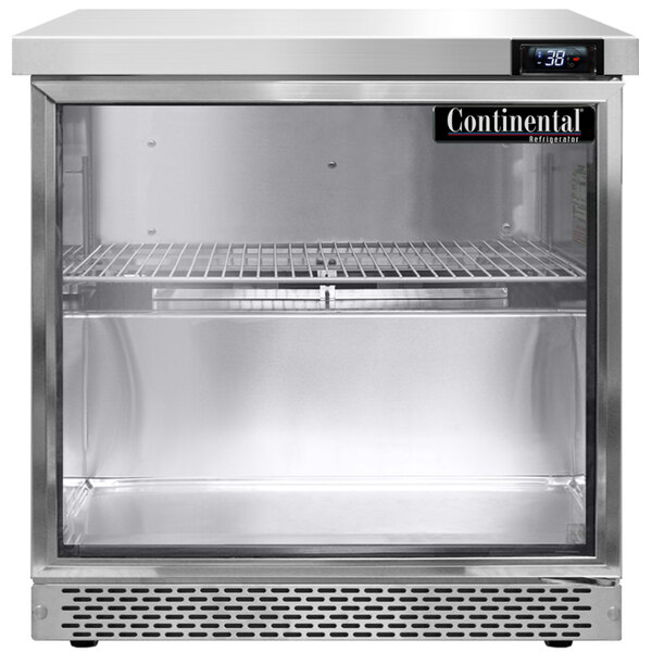 A Continental undercounter refrigerator with a glass door on a counter.