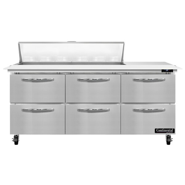 A Continental Refrigerator stainless steel 6 drawer cutting top refrigerated sandwich prep table.