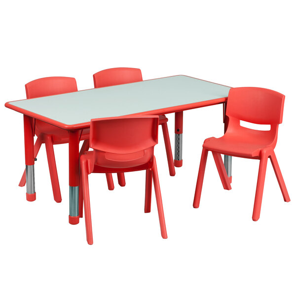 A red plastic Flash Furniture rectangular table with four chairs around it.