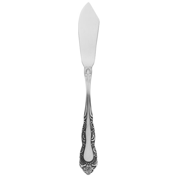 A Walco stainless steel butter spreader with a design on the handle.