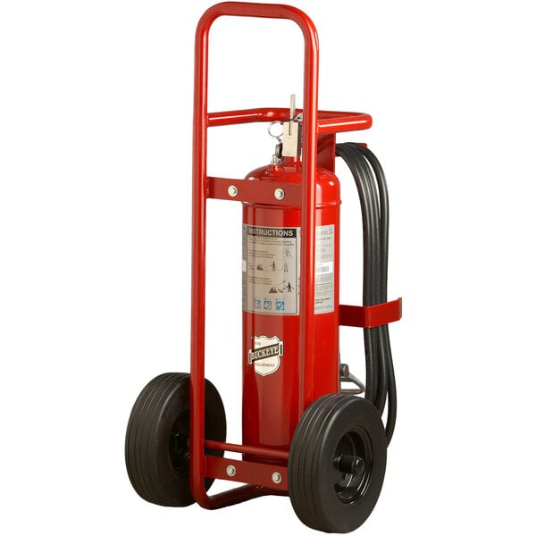 A red Buckeye wheeled ABC fire extinguisher with black rubber wheels.
