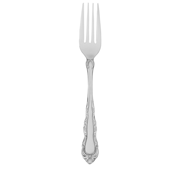 A silver Walco Patrician dinner fork with a white background.