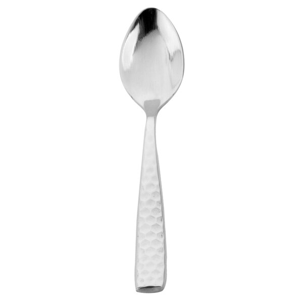 A Walco stainless steel demitasse spoon with a hexagon pattern on the handle.