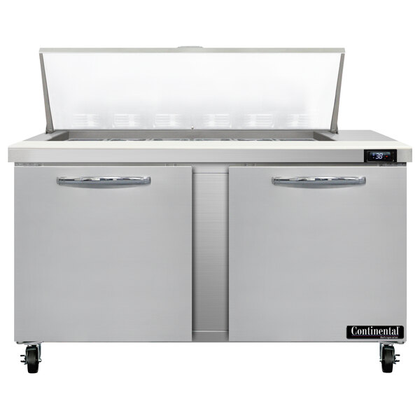 A stainless steel Continental Refrigerator with two doors and drawers.