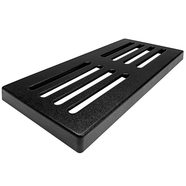 A black rectangular slotted riser with holes.