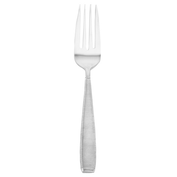 A Walco stainless steel table fork with a silver handle.