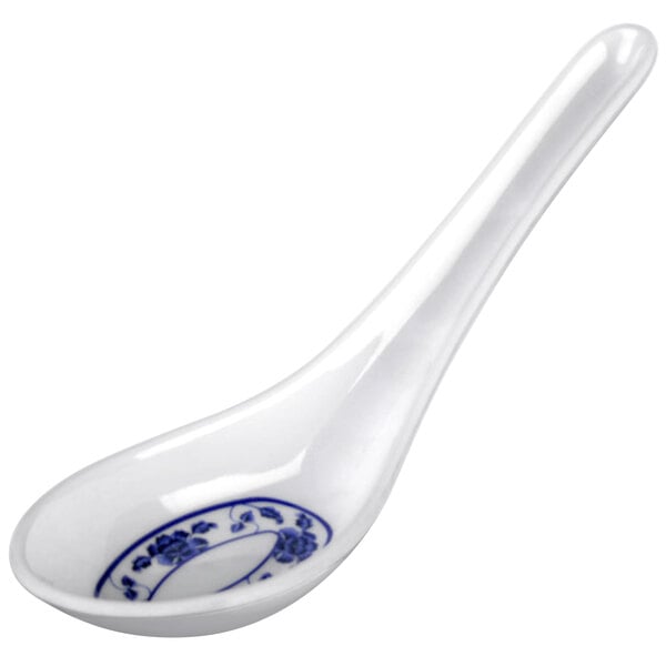 A white and blue Thunder Group Lotus wonton soup spoon.