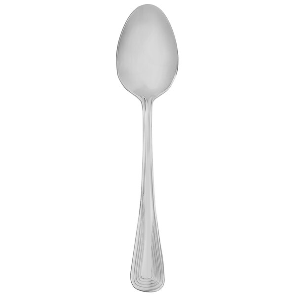 A silver Walco stainless steel teaspoon with a white handle.