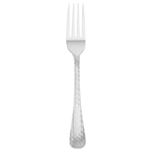 A Walco stainless steel dinner fork with a textured silver handle.