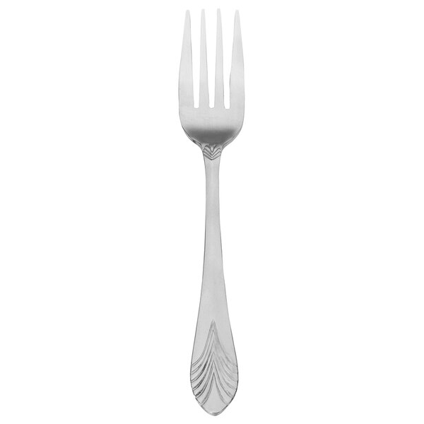 A Walco stainless steel dinner fork with a silver design on the handle.