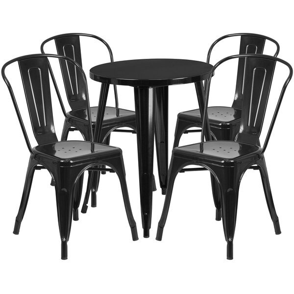 A black metal Flash Furniture table with four black chairs around it.