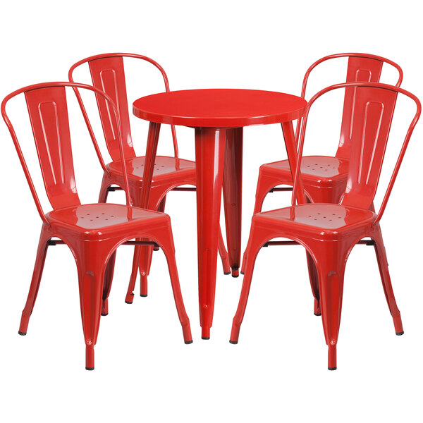 A red metal table and chairs set with a white background.