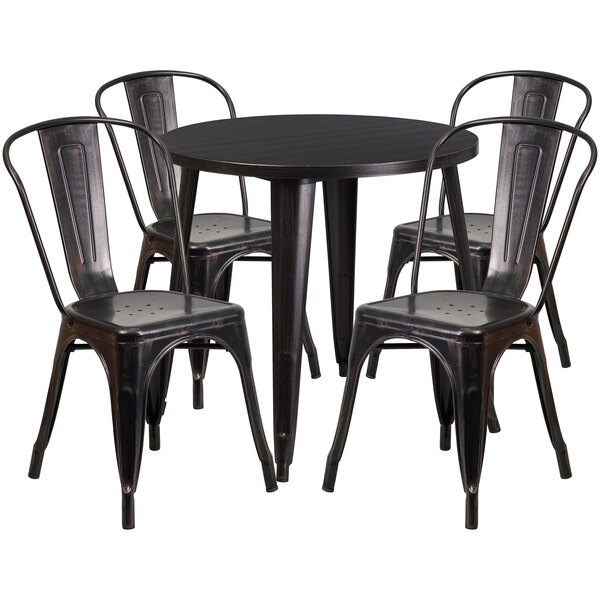 A Flash Furniture black metal table with four black metal chairs.